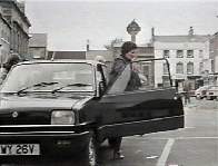 Screencap from The Outsider